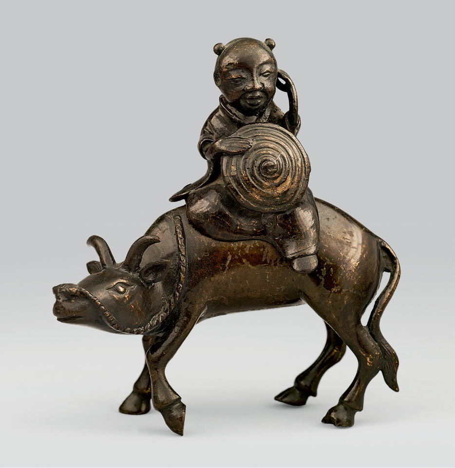 Incense burner in the shape of a Chinese boy on a water buffalo