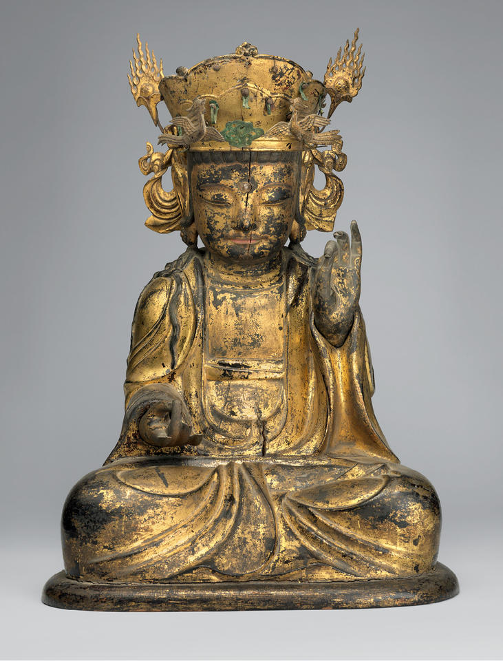 Seated Bodhisattva (left attendant of a triad)