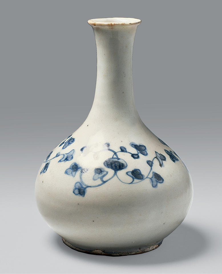 Bottle with floral scroll